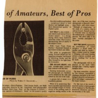 Newspaper clipping featuring pliers and a sphere in between their forceps.
